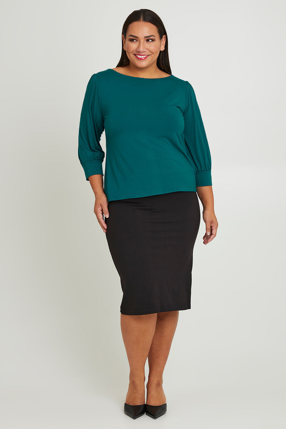 Model Jane wearing size 16 of The Bamboo Boat Neck Top in colour Tealgreen (Green), from the front, showing the whole outfit