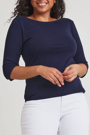 Model Terri-Leigh wearing size 14 of The Reversible Cotton Stretch Top in colour Navy (Blue), from the front, cropped image