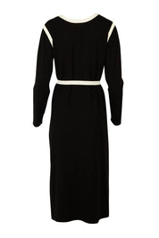 Product shot of The Reversible Contrast Detail Knit Dress in colour Black (Black), from the back