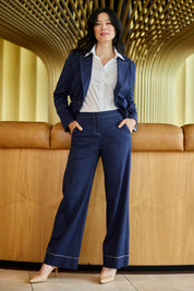 Model Miranda wearing size 10 of The Contrast Stitching Stretch Blazer in colour Navy (Blue), from the front, showing the whole outfit