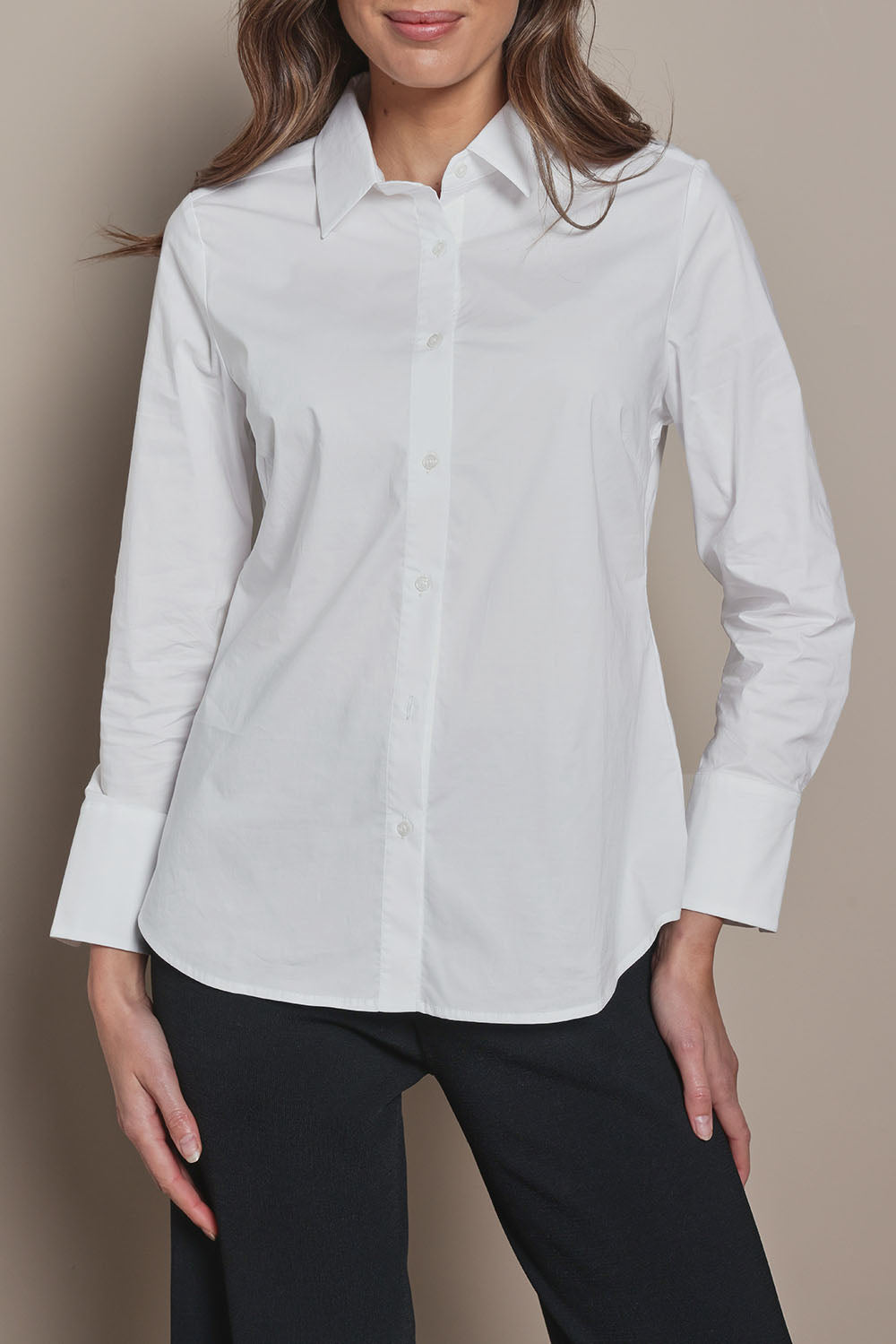 Model Madeline wearing size 10 of The Classic Cotton Stretch Shirt in colour White (White), from the front, cropped image