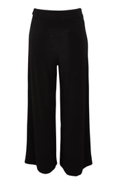 Product shot of The Palazzo Jersey Pull On Pant in colour Black (Black), from the front