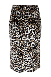 Product shot of The Printed Velvet Pull On Skirt in colour Leopard (Black), from the back