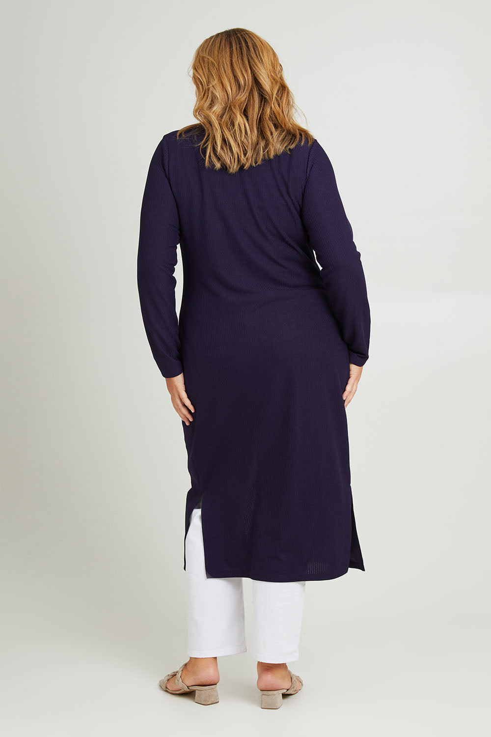 Model Fiona wearing size 16 of The Button Through Rib Dress With Belt in colour Indigo (Blue), from the back