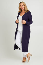 Model Fiona wearing size 16 of The Button Through Rib Dress With Belt in colour Indigo (Blue), from the front, showing the whole outfit