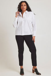 Model Terri-Leigh wearing size 14 of The Dolman Sleeve Cotton Shirt in colour Snow (White), from the front, showing the whole outfit