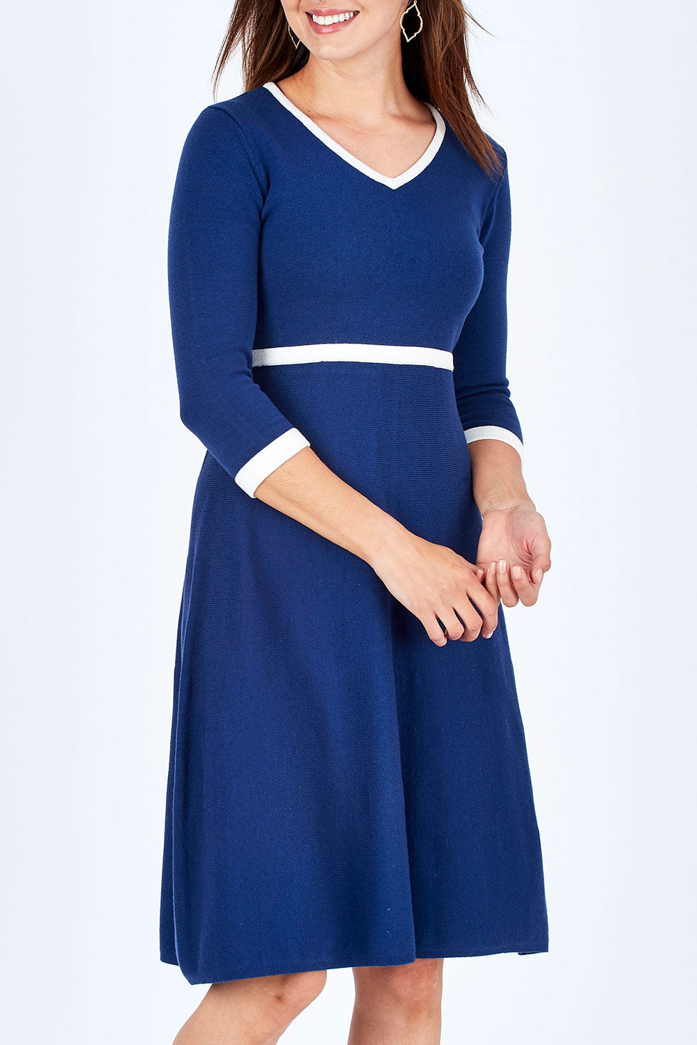 Model Rebecca wearing size S of The Fit And Flare Knit Dress in colour NavyIvory (Blue), from the front, cropped image