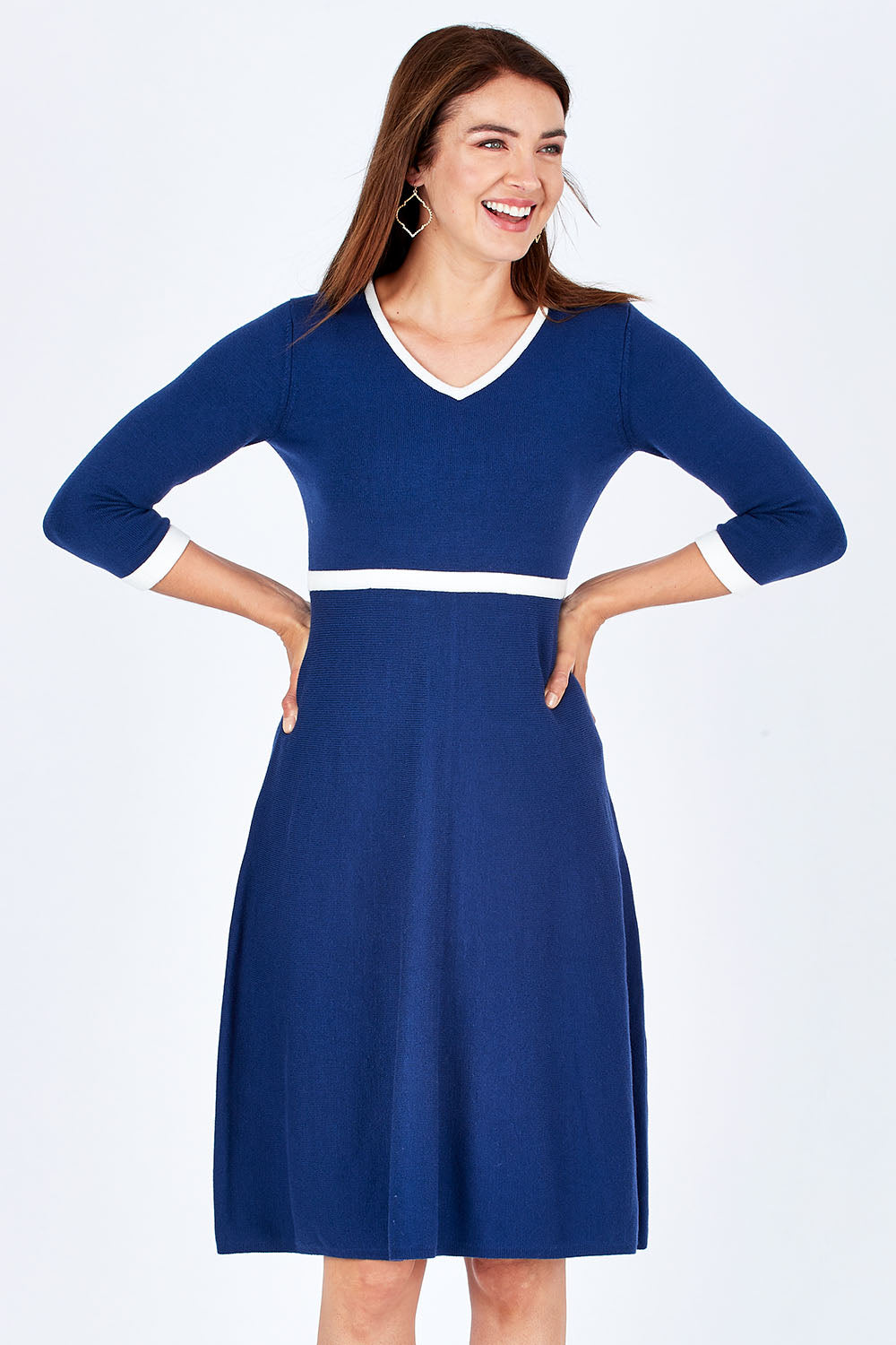Model Rebecca wearing size S of The Fit And Flare Knit Dress in colour NavyIvory (Blue), from the front, cropped image