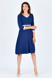Model Rebecca wearing size S of The Fit And Flare Knit Dress in colour NavyIvory (Blue), from the front, showing the whole outfit