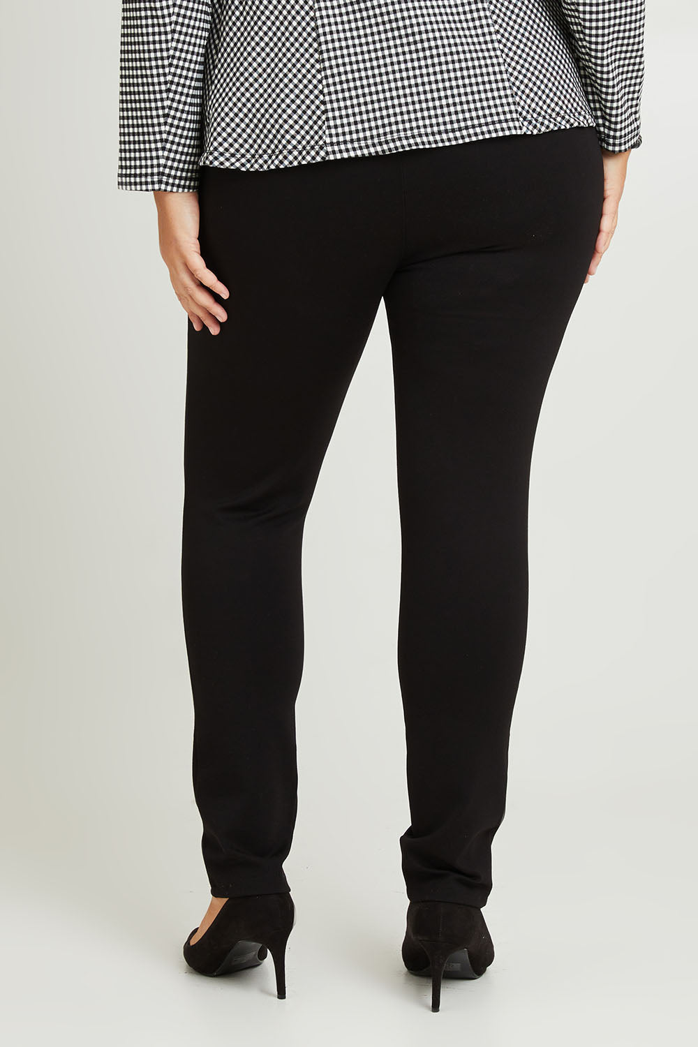 Model Fiona wearing size 16 of The High Rise Pull On Ponte Pant in colour Black (Black), from the back