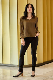 Model Miranda wearing size 10 of The High Rise Pull On Ponte Pant in colour Black (Black), from the front, showing the whole outfit