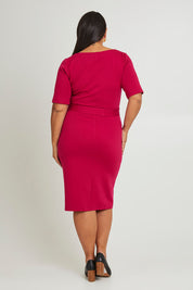 Model Ashleigh wearing size 16 of The Square Neck Ponte Dress in colour Raspberry (Pink), from the back