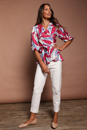 Model Amanda wearing size 10 of The 7/8 Cotton Stretch Pull On Pant in colour Snow (White), from the front, showing the whole outfit