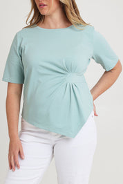 Model Chanel wearing size 16 of The Cotton Stretch Waist Detail Top in colour Duckegg (Blue), from the front, cropped image