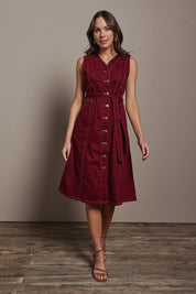 Model Madeline wearing size 10 of The Cotton Twill Contrast Stitching Dress in colour Burgundy (Red), from the front, showing the whole outfit