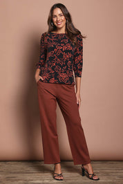 Model Madeline wearing size 10 of The Straight Cut Pull On Ponte Pant in colour Cinnamon, from the front, showing the whole outfit
