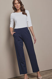 Model Madeline wearing size 10 of The Straight Cut Pull On Ponte Pant in colour Darknavy (Blue), from the front, showing the whole outfit