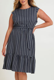 Model Chanel wearing size 16 of The Stripe Cotton Cap Sleeve Dress in colour Navy (Blue), from the front, cropped image