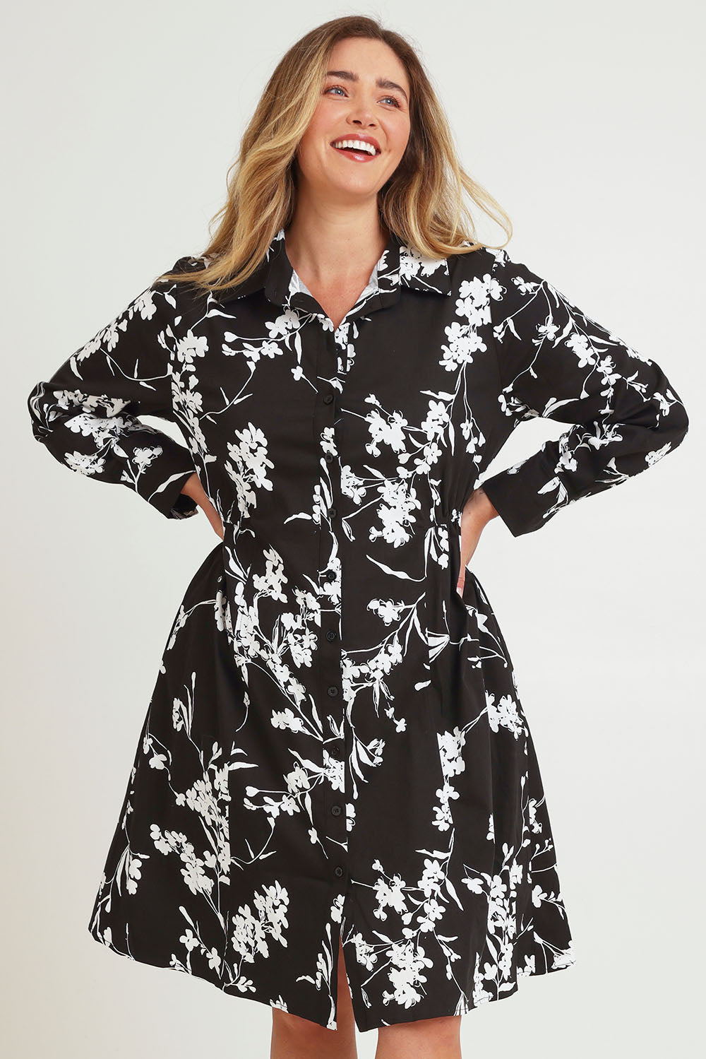 Model Chanel wearing size 16 of The Printed Cotton Stretch Shirt Dress in colour Blackfleur (Black), from the front, cropped image