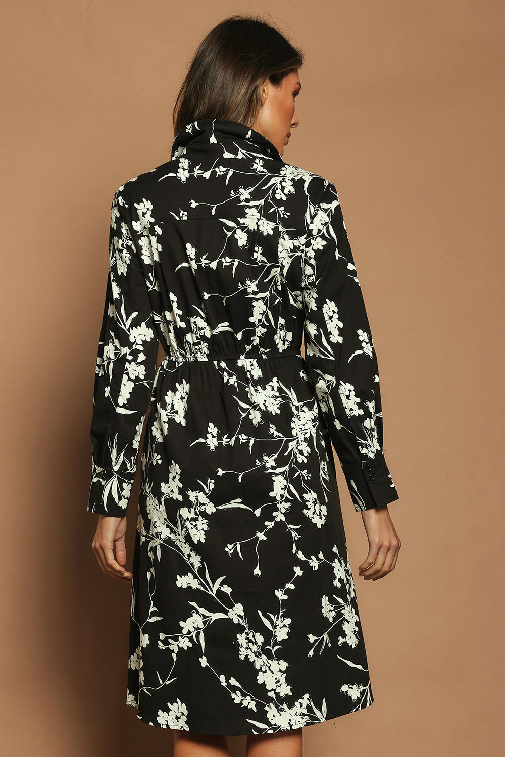 Model Madeline wearing size 10 of The Printed Cotton Stretch Shirt Dress in colour Blackfleur (Black), from the back