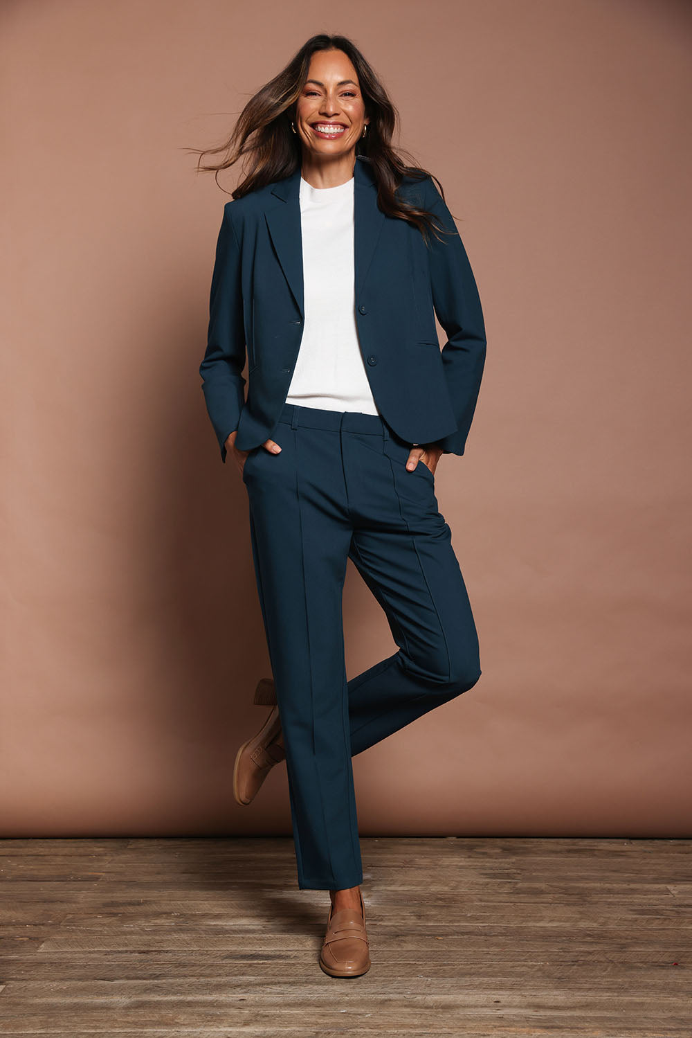 Model Amanda wearing size 10 of The Pintuck Detail Blazer in colour Deepocean (Blue), from the front, showing the whole outfit