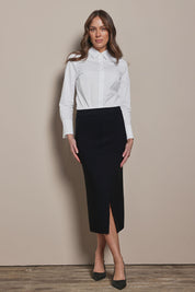 Model Madeline wearing size S of The Crepe Knit Multiway Pull On Skirt in colour Black (Black), from the front, showing the whole outfit