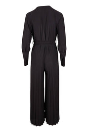 Product shot of The Pleated Wide Leg Jumpsuit in colour Black (Black), from the back