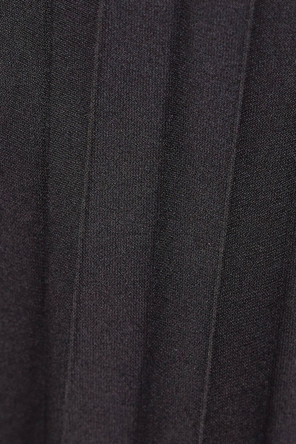 Product shot of The Pleated Wide Leg Jumpsuit in colour Black (Black), detail