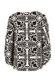 Product shot of The Printed Bishop Sleeve Blouse in colour Black (Black), from the back