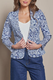 Model Madeline wearing size 10 of The Aspire Blazer in colour Peony (Blue), from the front, cropped image