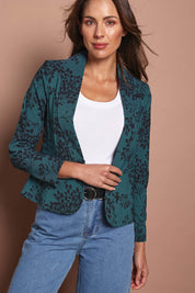 Model Madeline wearing size 10 of The Aspire Blazer in colour Tealbloom (Green), from the front, cropped image