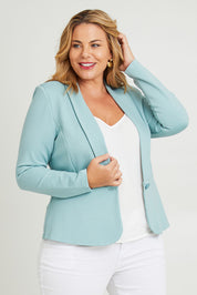 Model Fiona wearing size 16 of The Ponte Aspire Blazer in colour Aquahaze (Blue), from the front, cropped image