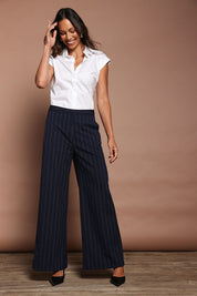 Model Amanda wearing size 10 of The Wide Leg Stripe Pant in colour Navy (Blue), from the front, showing the whole outfit