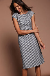 Model Amanda wearing size 10 of The Cotton Stretch Gingham Dress in colour Gingham (Black), from the front, showing the whole outfit