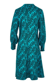 Product shot of The Printed Cotton Button Through Dress in colour Tealbamboo (Blue), from the back