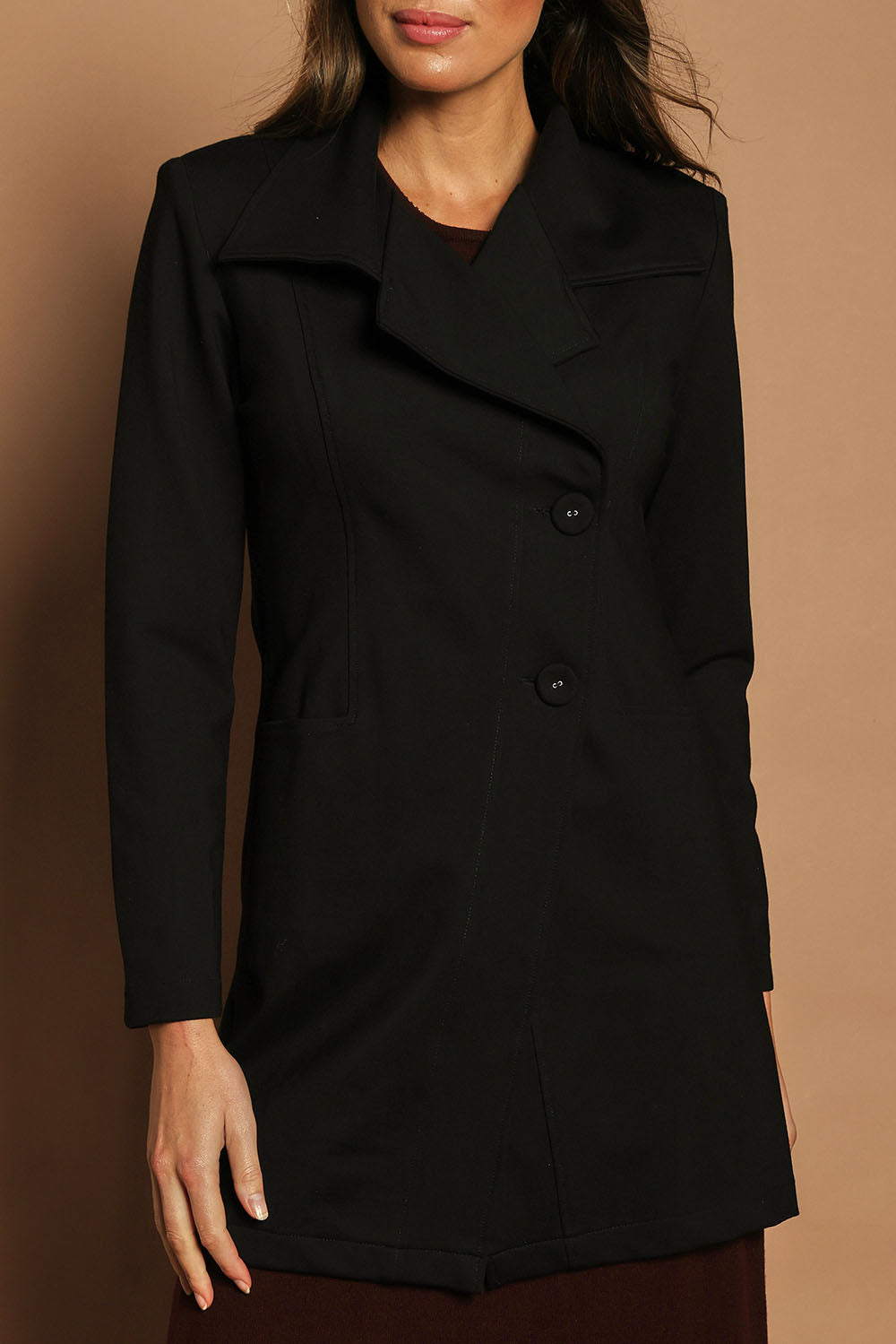 Model Madeline wearing size 10 of The Ponte Longline Collar Jacket in colour Black (Black), from the front, cropped image