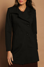 Model Madeline wearing size 10 of The Ponte Longline Collar Jacket in colour Black (Black), from the front, cropped image