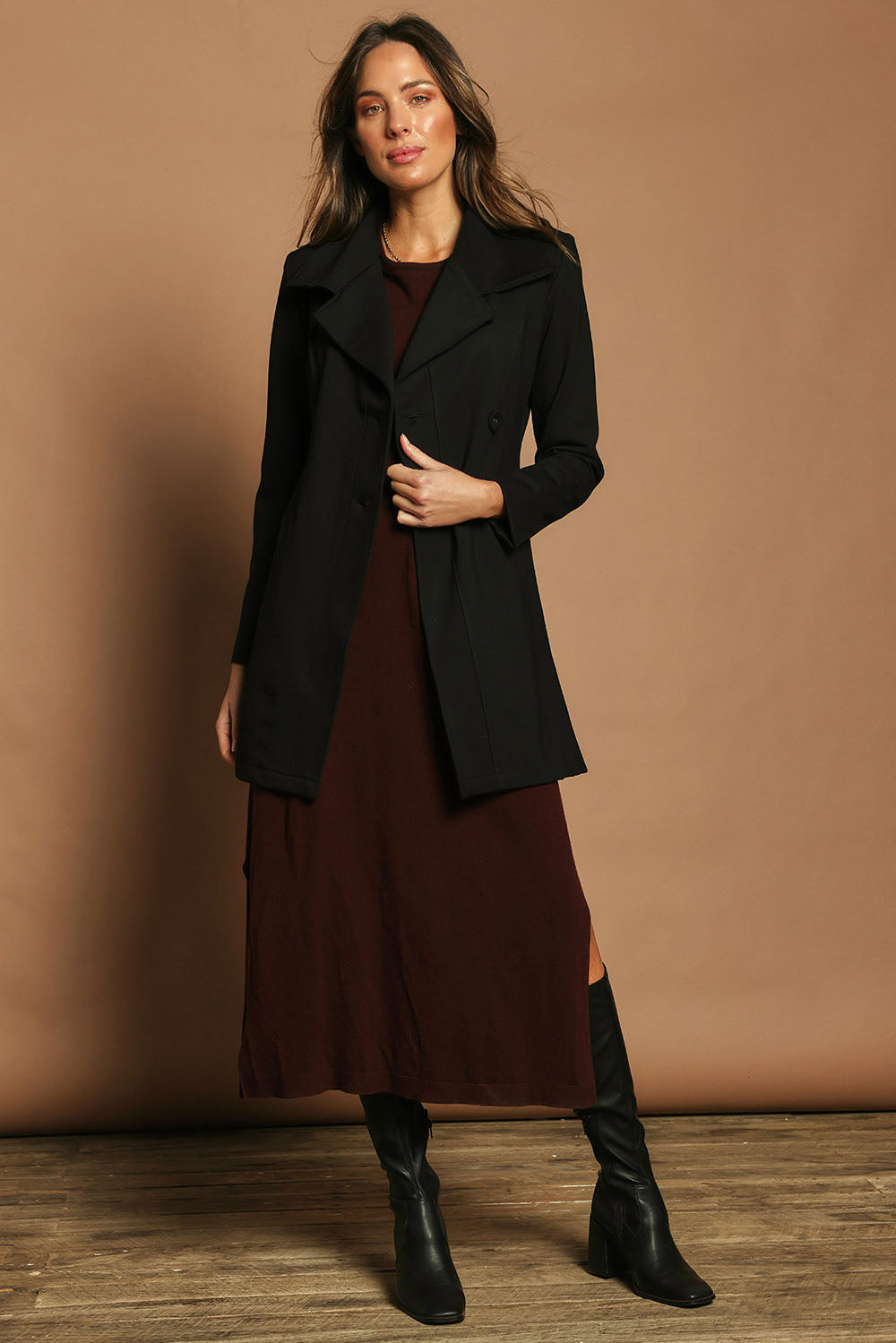 Model Madeline wearing size 10 of The Ponte Longline Collar Jacket in colour Black (Black), from the front, showing the whole outfit