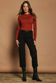 Model Madeline wearing size 10 of The Ponte Tailored 7/8 Pant in colour Black (Black), from the front, showing the whole outfit