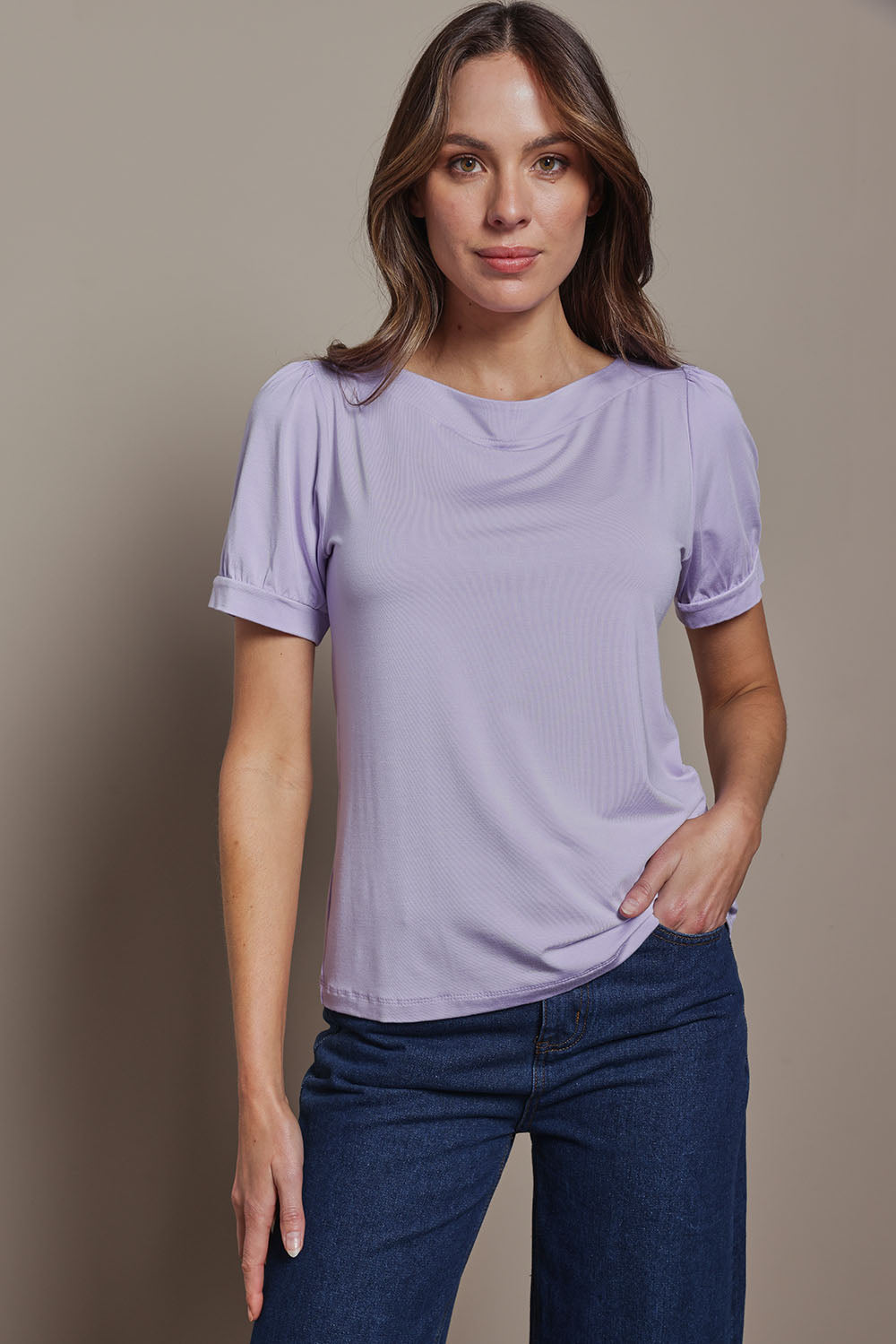 Model Madeline wearing size 10 of The Bamboo Boat Neck Short Sleeve Top in colour Lilac (Purple), from the front, showing the whole outfit