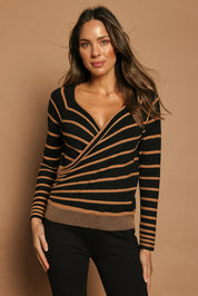 Model Madeline wearing size S of The Stripe Faux Wrap Jumper in colour Blacktan (Black), from the front, cropped image