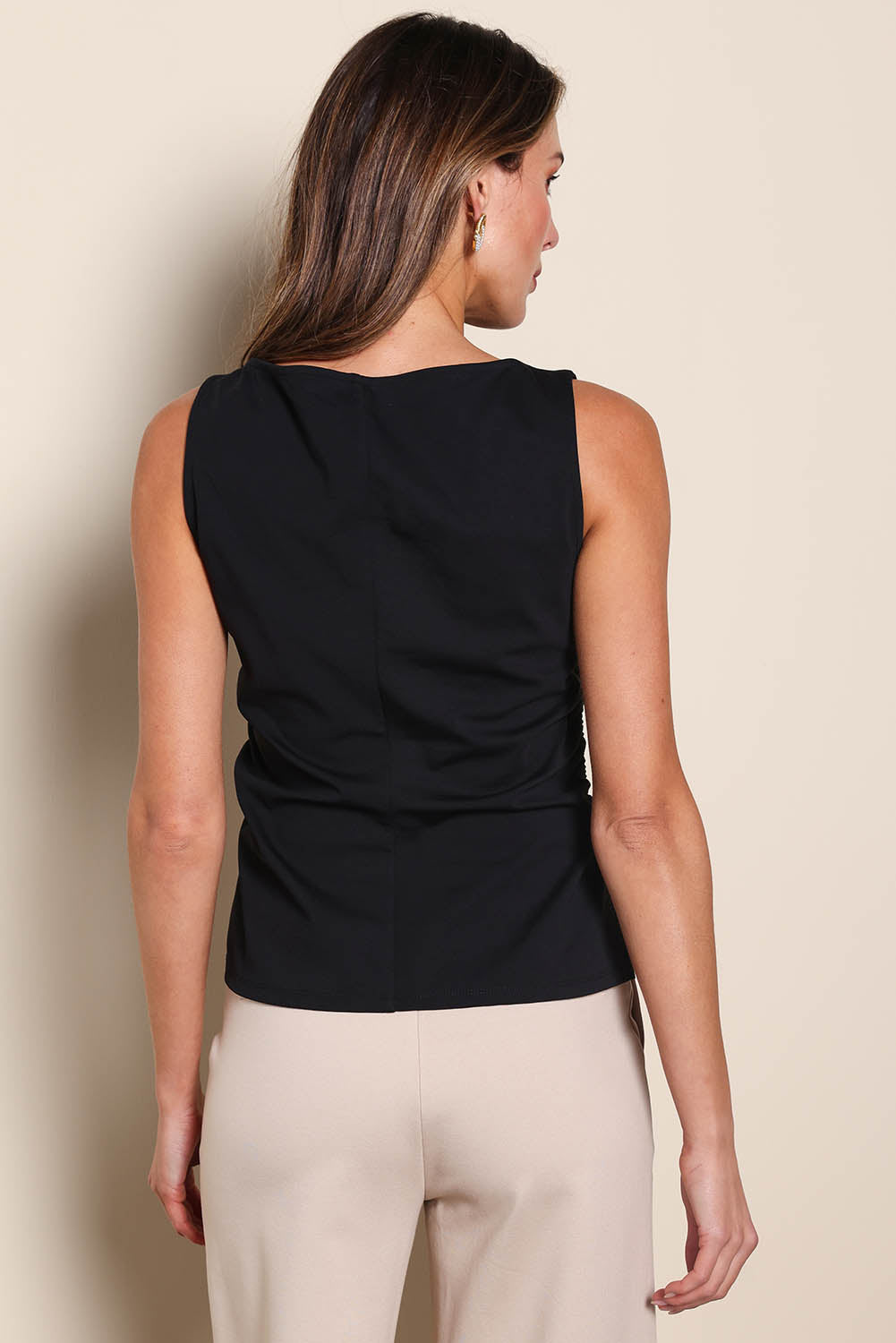 Model Madelinec wearing size 10 of the The Cotton Blend Ruched Waist Top - Black in colour Black, from the back
