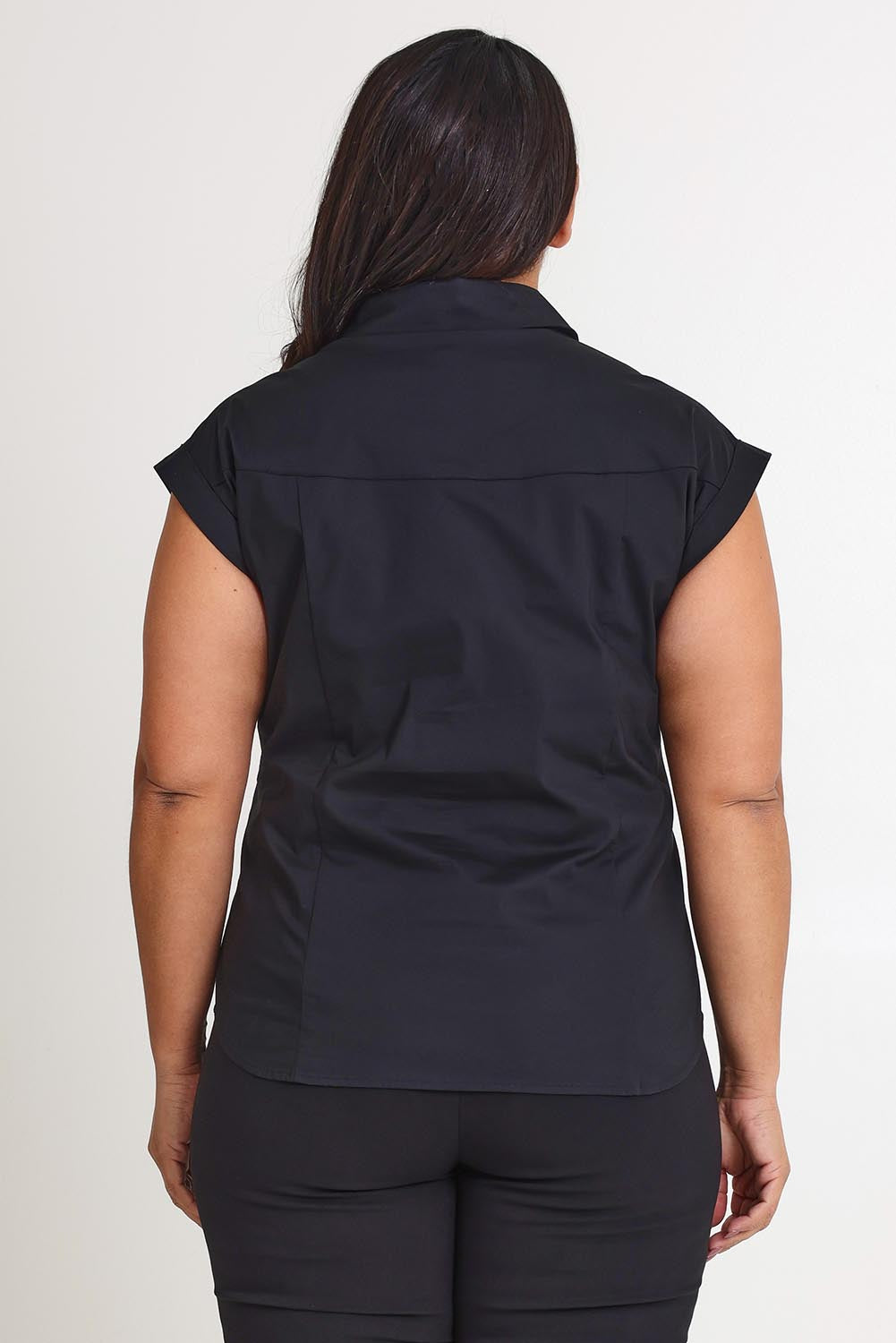 Model Ashleigh wearing size 16 of The Cap Sleeve Cotton Stretch Shirt in colour Black (Black), from the back