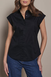 Model Madeline wearing size 10 of The Cap Sleeve Cotton Stretch Shirt in colour Black (Black), from the front, cropped image