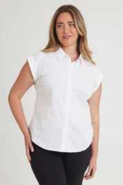 Model Chanel wearing size 16 of The Cap Sleeve Cotton Stretch Shirt in colour White (White), from the front, cropped image