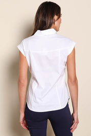 Model Madelinec wearing size 10 of the The Cap Sleeve Cotton Stretch Shirt - White in colour White, from the back