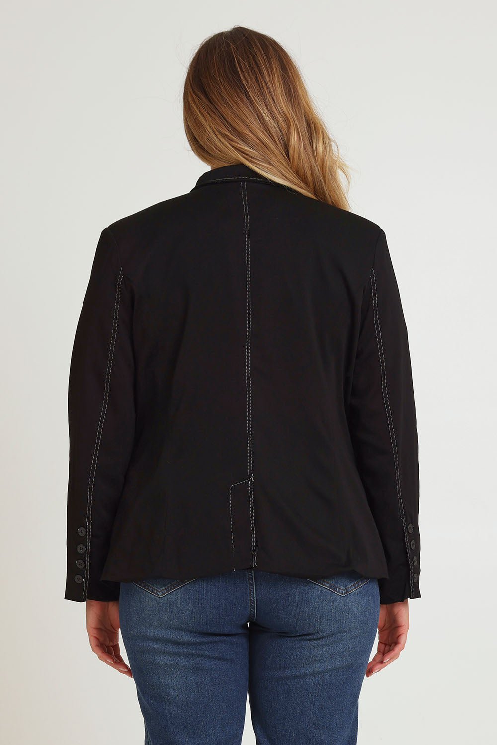 Model Chanel wearing size 16 of The Contrast Stitching Stretch Blazer in colour Black (Black), from the back
