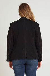 Model Chanel wearing size 16 of The Contrast Stitching Stretch Blazer in colour Black (Black), from the back