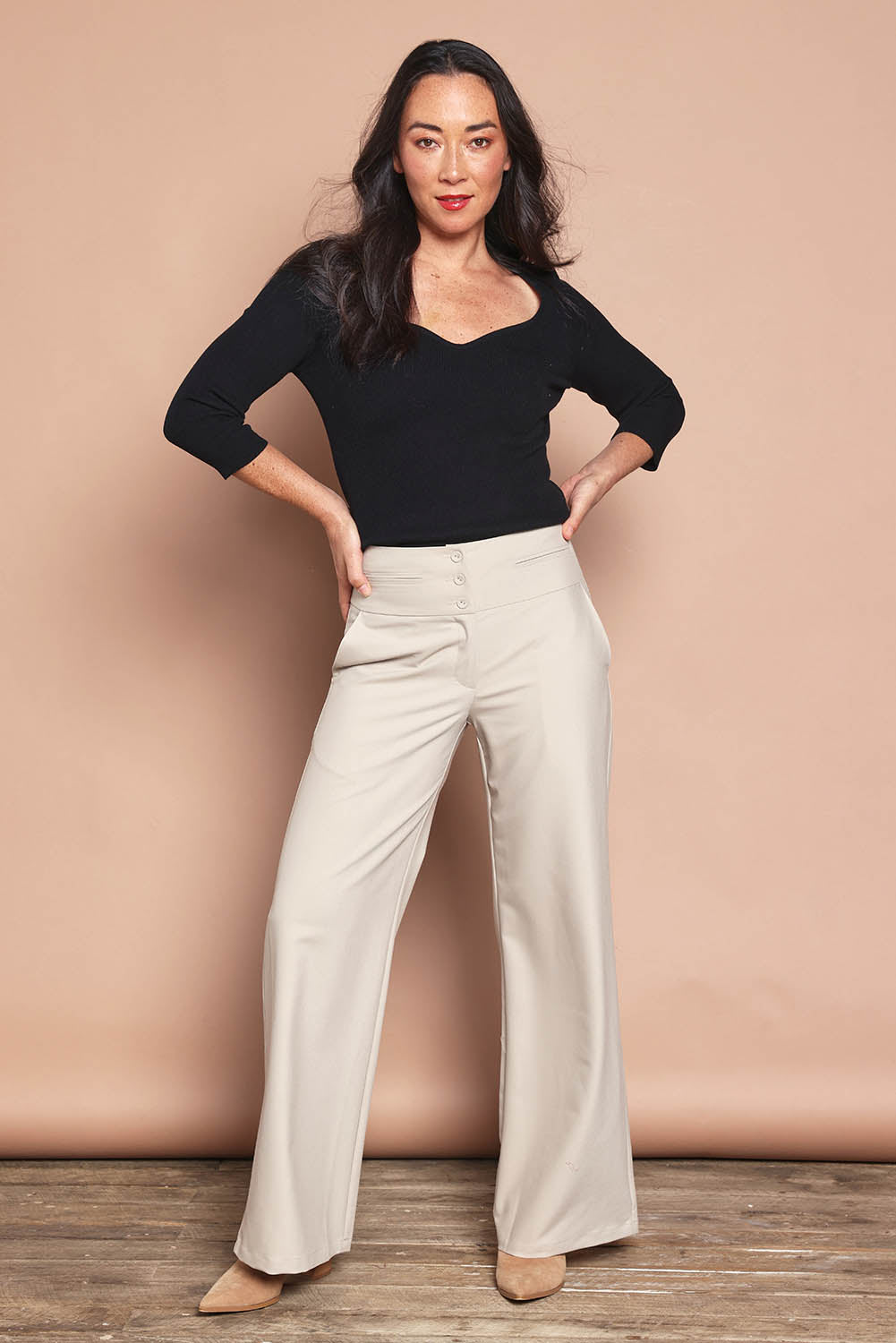Model Katie wearing size S of The Rib Knit Sweetheart Neck Top in colour Black (Black), from the front, showing the whole outfit