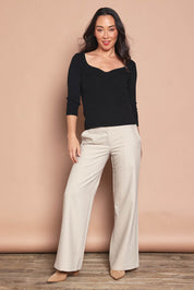 Model Katie wearing size S of The Rib Knit Sweetheart Neck Top in colour Black (Black), from the front, showing the whole outfit